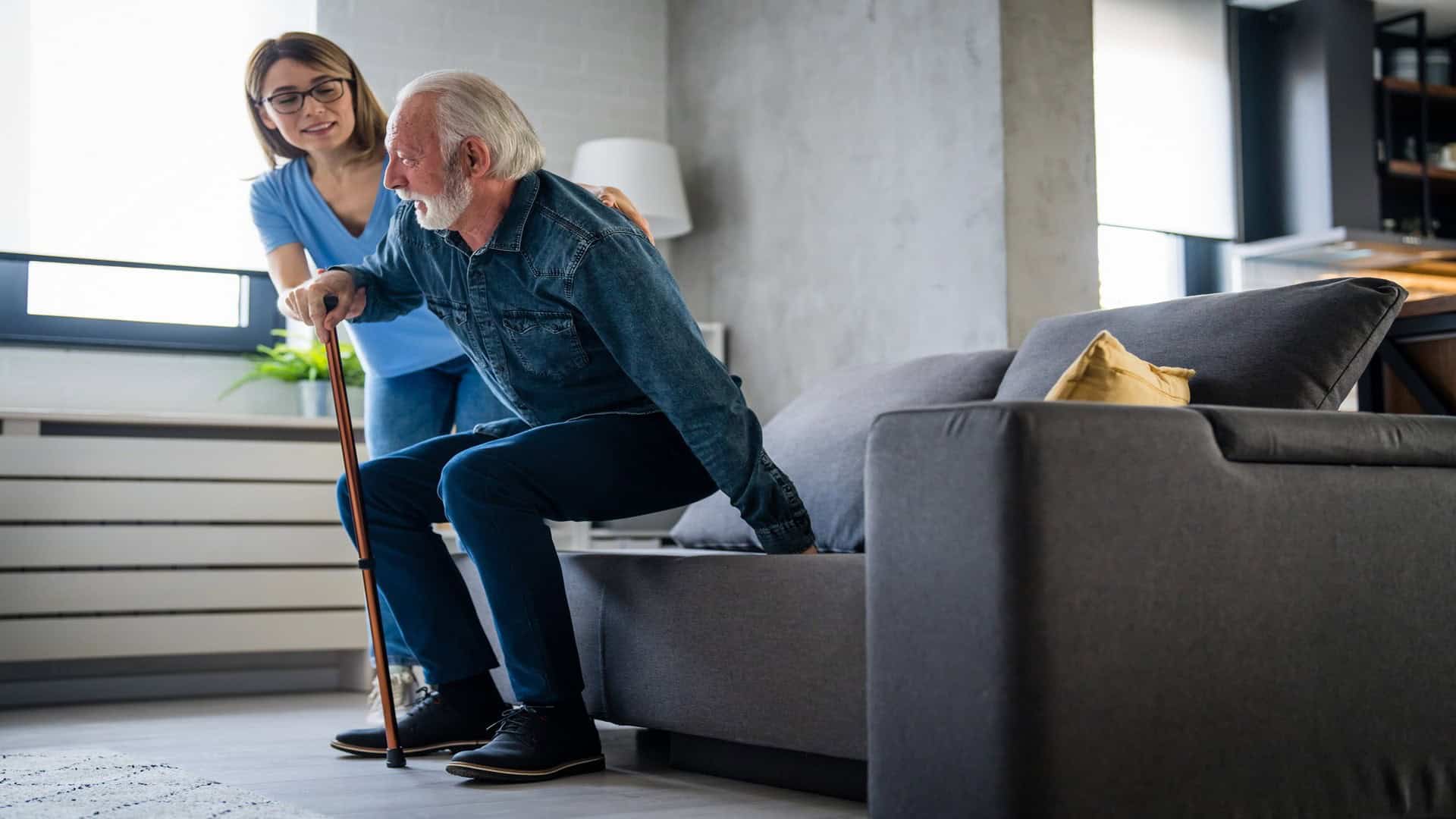 Smiling Senior Man With Female Healthcare Worker